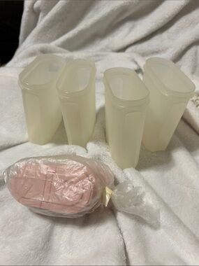 Tupperware Storage Containers and lids with 2 openings. About 4.5 inches